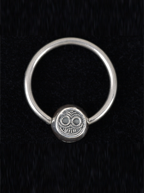 DOUBLE FACE TIBEKKOTSU EARRING